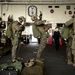 Riggers and Recon Marines jump over Ie Shima