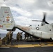 Riggers and Recon Marines jump over Ie Shima