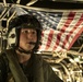 Riggers and Recon Marines jump over Ie Shima