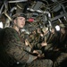 Riggers and Recon Marines jump over Ie Shima