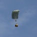 Riggers and Recon Marines jump over Ie Shima