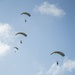 Riggers and Recon Marines jump over Ie Shima
