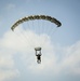 Riggers and Recon Marines jump over Ie Shima