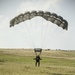 Riggers and Recon Marines jump over Ie Shima