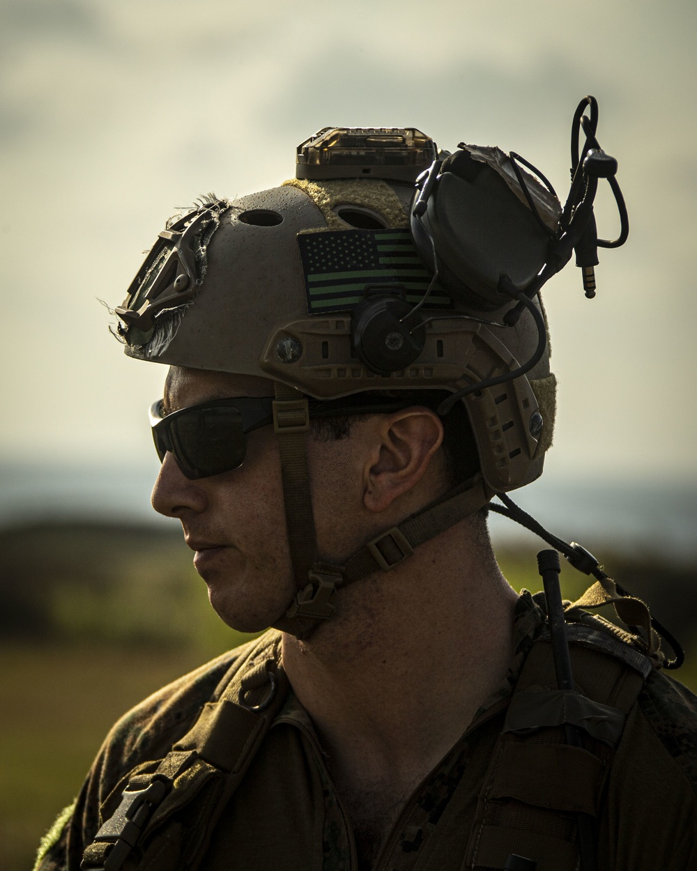 Riggers and Recon Marines jump over Ie Shima