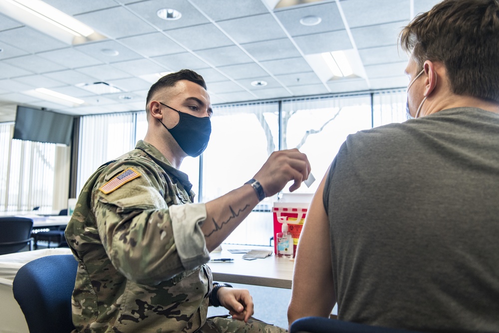 Michigan National Guard, Administers the COVID-19 Vaccine to front line workers.