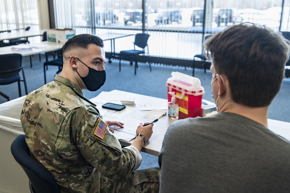 Michigan National Guard, Administers the COVID-19 Vaccine to front line workers.