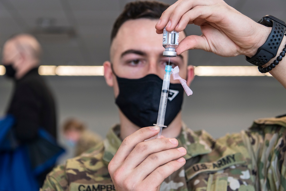 Michigan National Guard, Administers the COVID-19 Vaccine to front line workers.