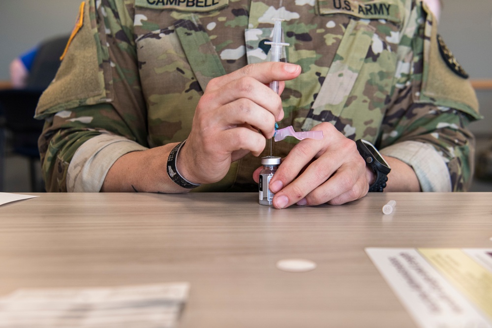 Michigan National Guard, Administers the COVID-19 Vaccine to front line workers.