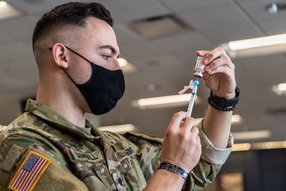 Michigan National Guard, Administers the COVID-19 Vaccine to front line workers.