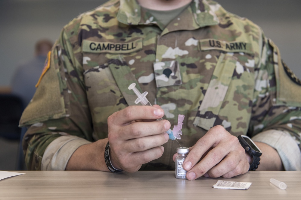 Michigan National Guard, Administers the COVID-19 Vaccine to front line workers.