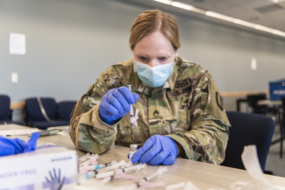 Michigan National Guard, Administers the COVID-19 Vaccine to front line workers.