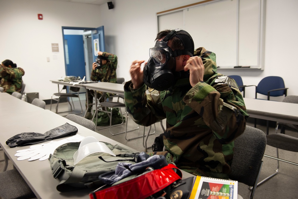 Airmen participate in CBRNE class