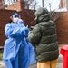 Members of the Maryland National Guard assists residents with COVID-19 self testing in Baltimore Maryland.