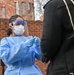 Members of the Maryland National Guard assists residents with COVID-19 self testing in Baltimore Maryland.