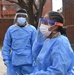 Members of the Maryland National Guard assists residents with COVID-19 self testing in Baltimore Maryland