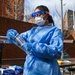 Members of the Maryland National Guard assists residents with COVID-19 self testing in Baltimore Maryland.