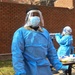 Members of the Maryland National Guard assists residents with COVID-19 self testing in Baltimore Maryland.