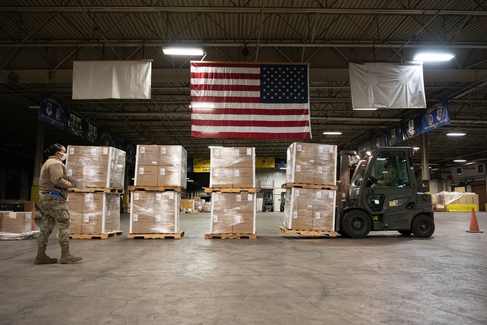 60th APS Airmen receive and palletize N-95 masks