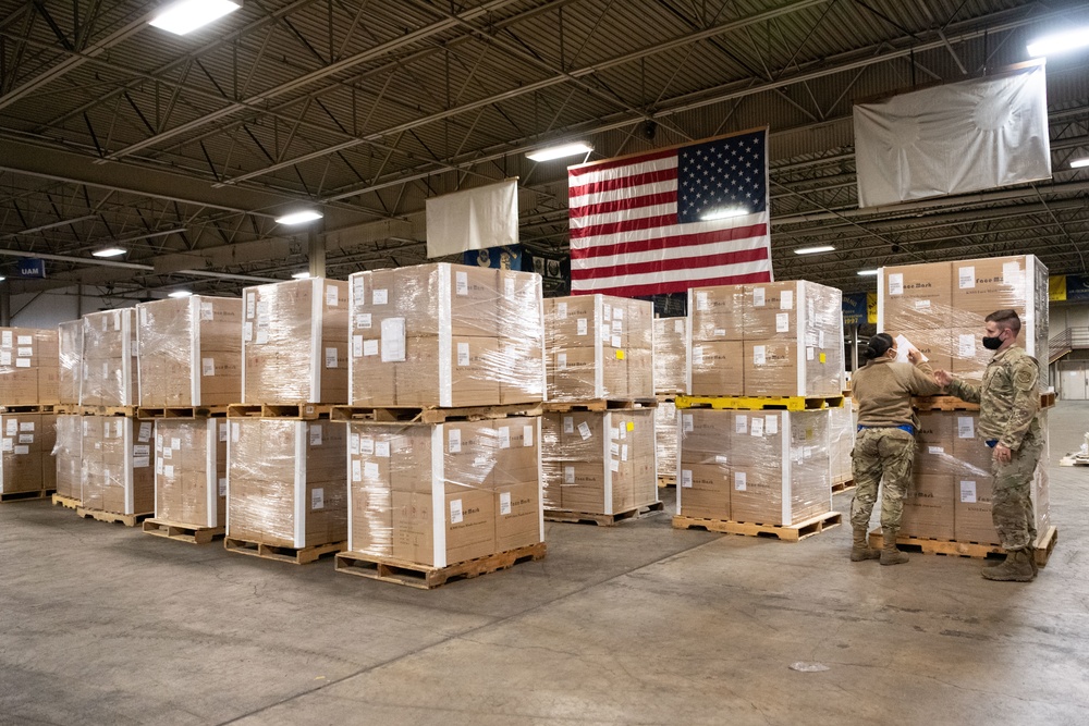 60th APS Airmen receive and palletize N-95 masks