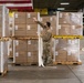 60th APS Airmen receive and palletize N-95 masks