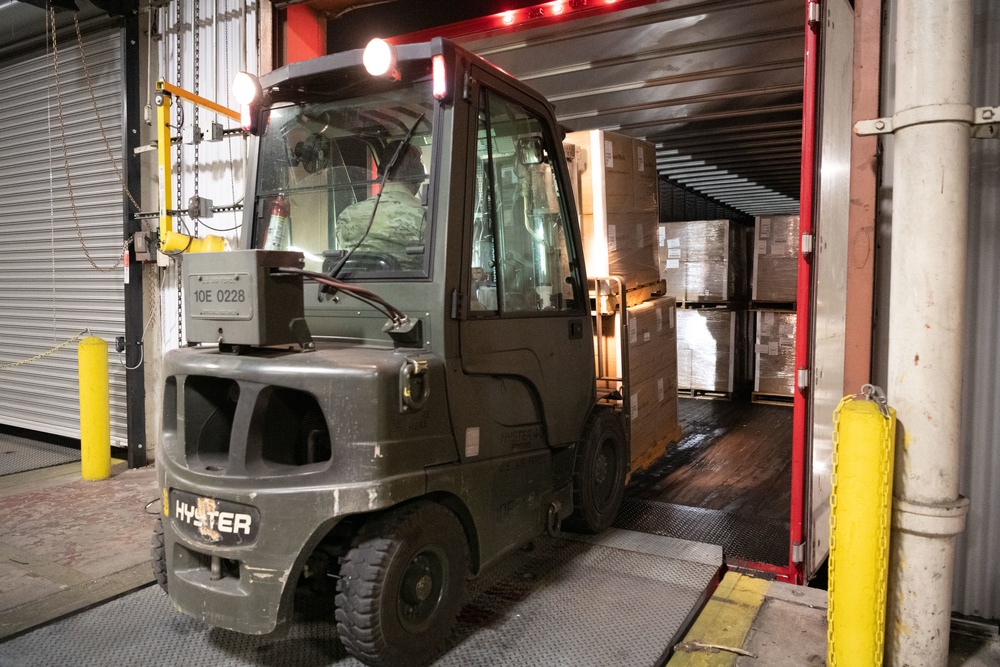 60th APS Airmen receive and palletize N-95 masks