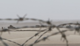Iron Union 14, U.S. Army tanks simulate breaching mine-wire obstacle