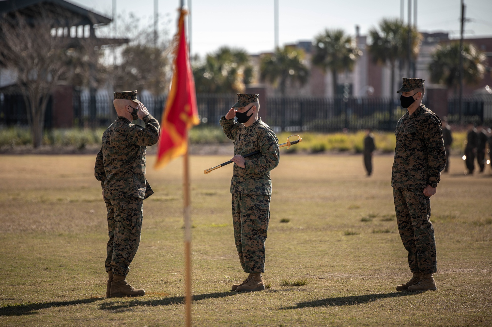 Sgt. Maj. Carlos Ruiz (center), outgoing sergeant major of 4th
