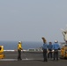 Sailors Perform Washdown