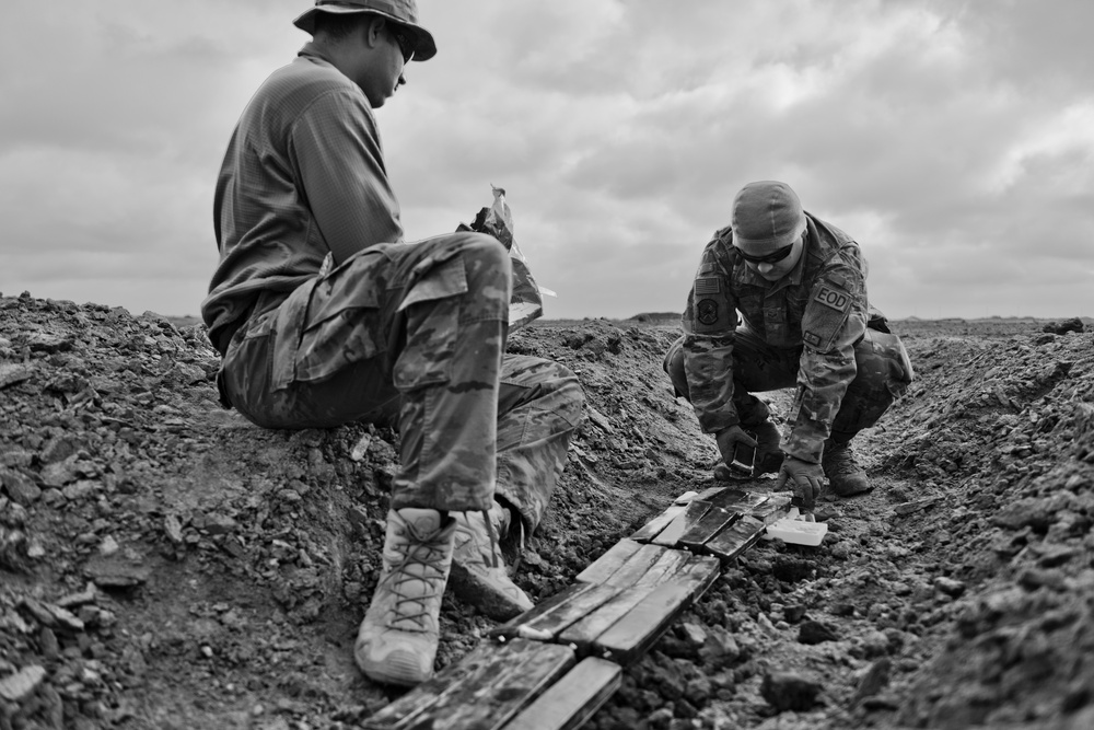 Members of the 332 Air Expeditionary Wing EOD Perform Ordnance Disposal