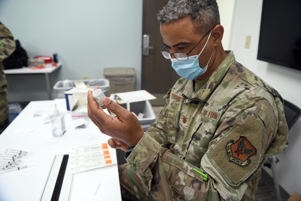 Robins administers COVID vaccine second doses