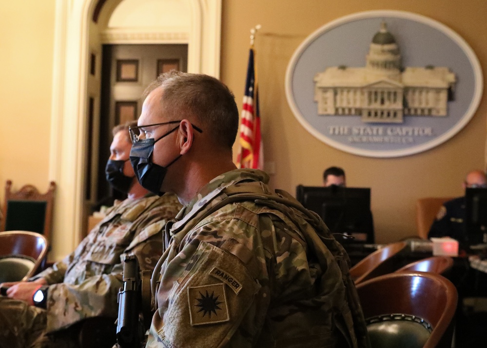 Cal Guard Col. Wooldridge receives security brief before inauguration