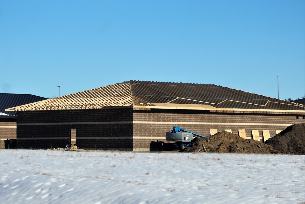 Last of 6 new simulations buildings under construction at Fort McCoy