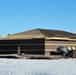 Last of 6 new simulations buildings under construction at Fort McCoy
