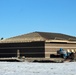 Last of 6 new simulations buildings under construction at Fort McCoy