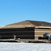 Last of 6 new simulations buildings under construction at Fort McCoy