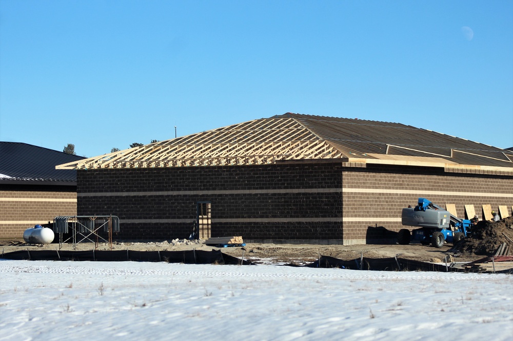 Last of 6 new simulations buildings under construction at Fort McCoy