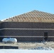 Last of 6 new simulations buildings under construction at Fort McCoy