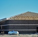 Last of 6 new simulations buildings under construction at Fort McCoy