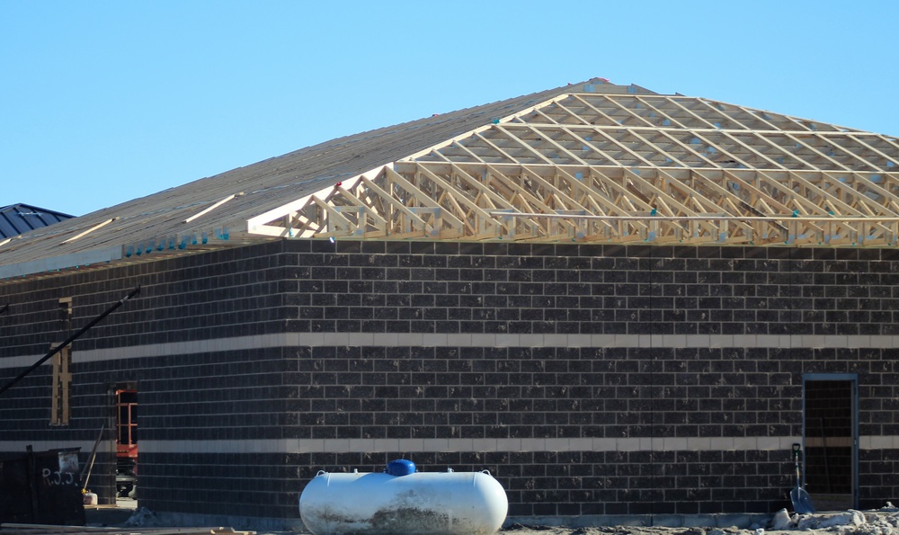 Last of 6 new simulations buildings under construction at Fort McCoy