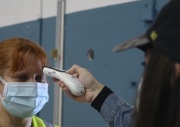 KMC volunteers help distribute COVID-19 vaccine