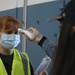 KMC volunteers help distribute COVID-19 vaccine