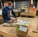 Material Examiner and Identifier Gregory Bryan performs receipt evaluations of turn-in property at the Defense Logistics Agency Disposition Services