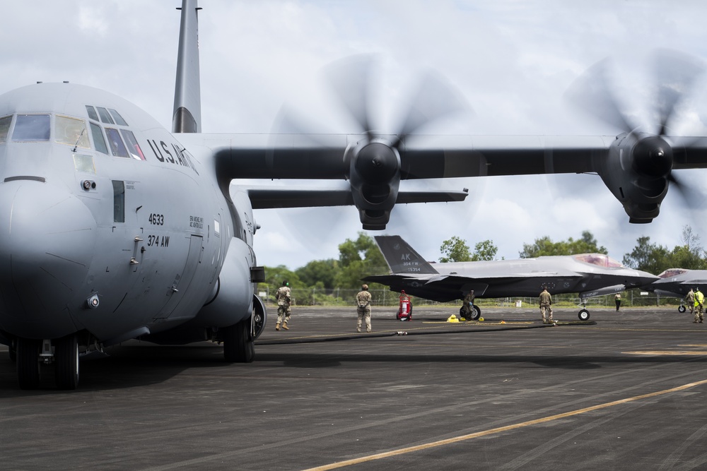 USAF C-130J Super Hercules Provides Fuel to F-35A Lightning IIs During Exercise Cope North 21
