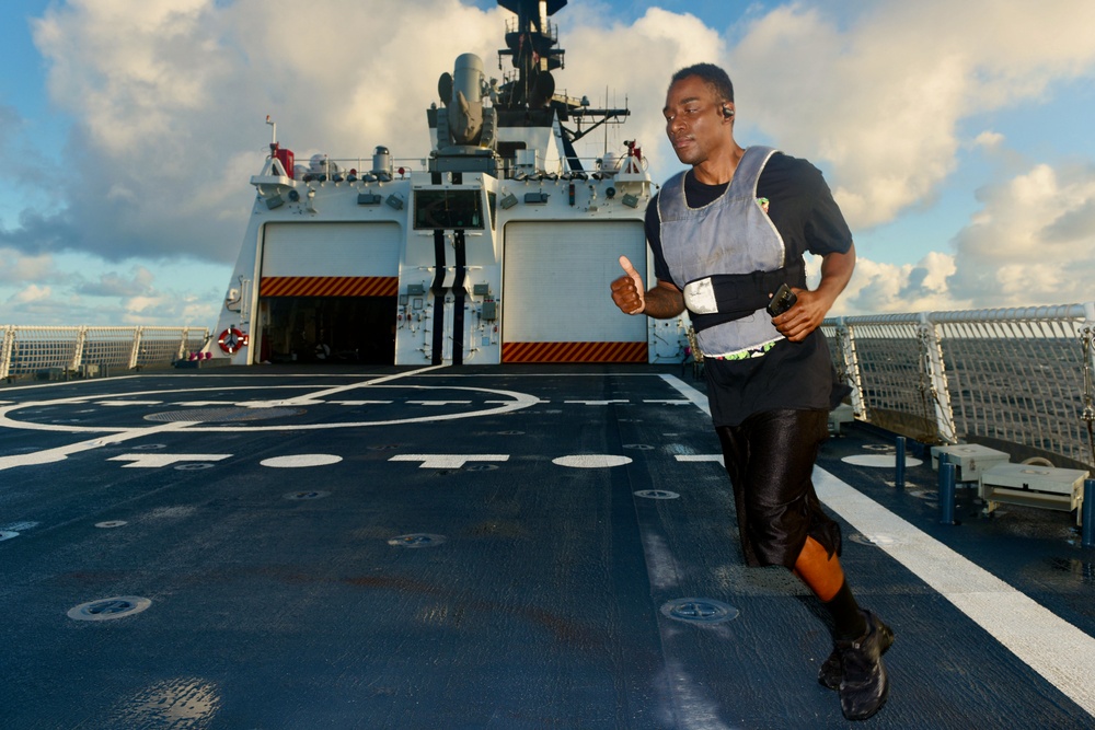 Senior Chief Joiner out for run on USCGC Stone (WMSL 758)