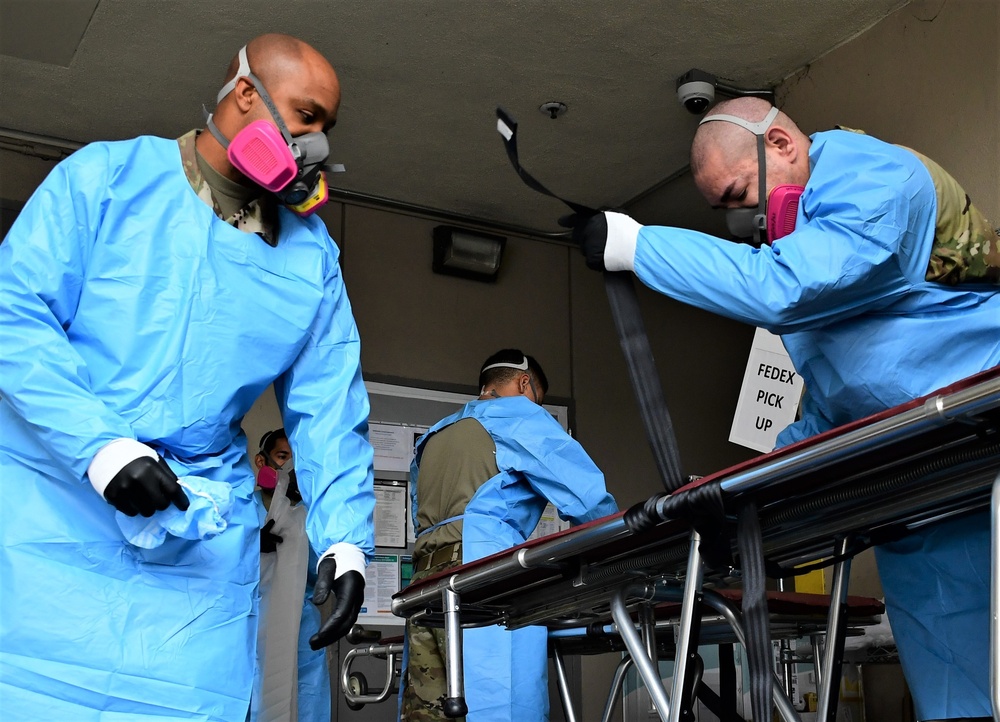 Final Respects: Cal Guardsmen support the living, while caring for the deceased