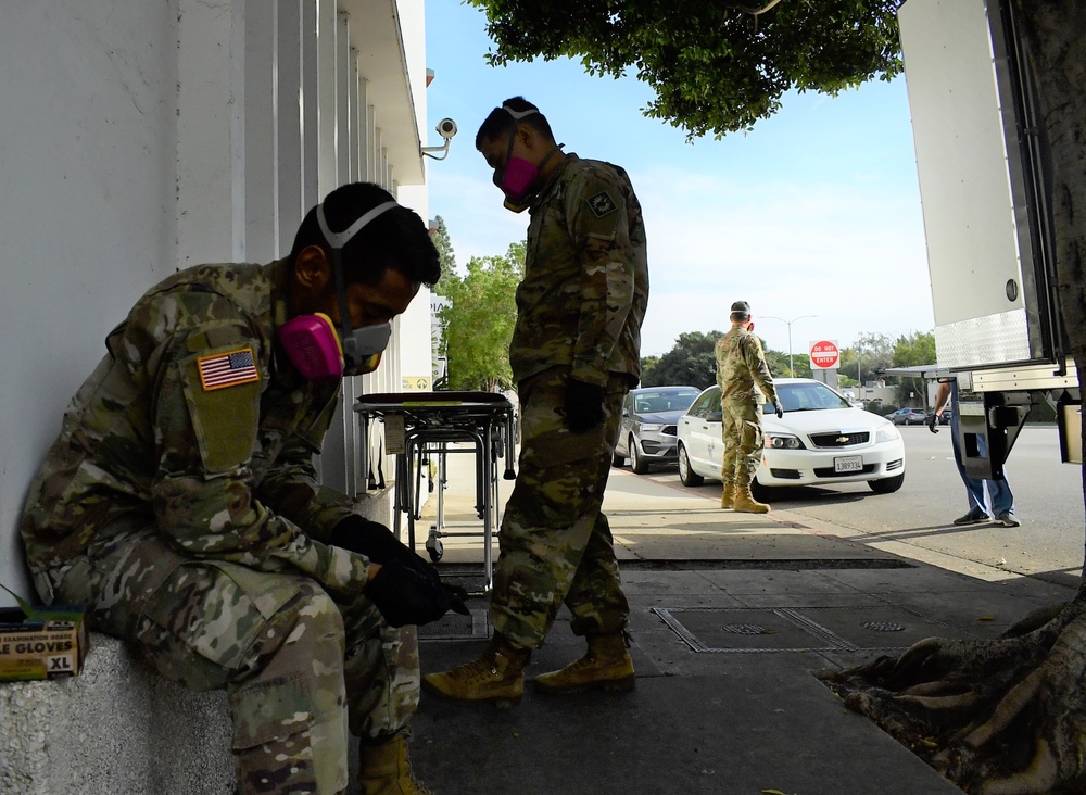 Final Respects: Cal Guardsmen support the living, while caring for the deceased