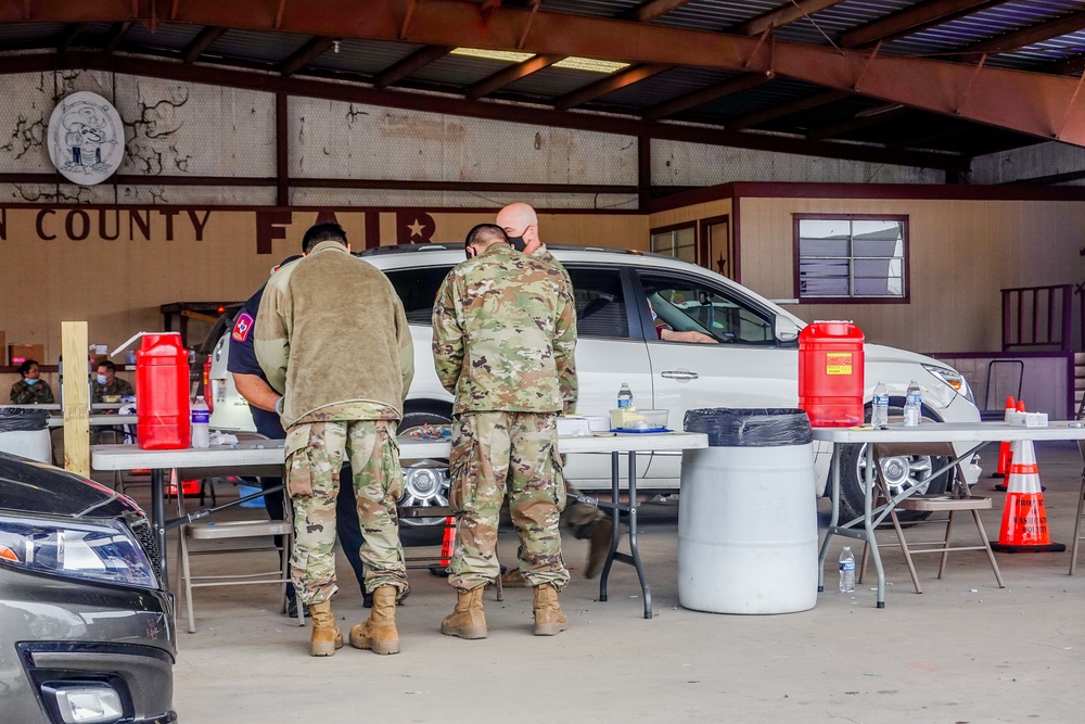 Texas Military Members work vaccination site in Washington County