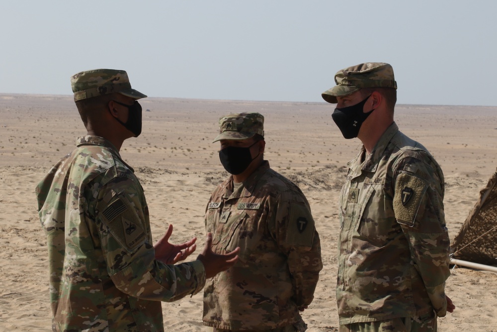 Task Force Spartan Public Affairs Soldiers receive coin, Iron Union 14