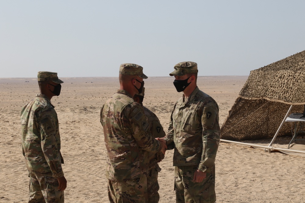 Task Force Spartan Public Affairs Soldiers receive coin, Iron Union 14